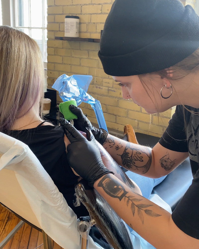 Photo of Lara Anderson, tattoo artist